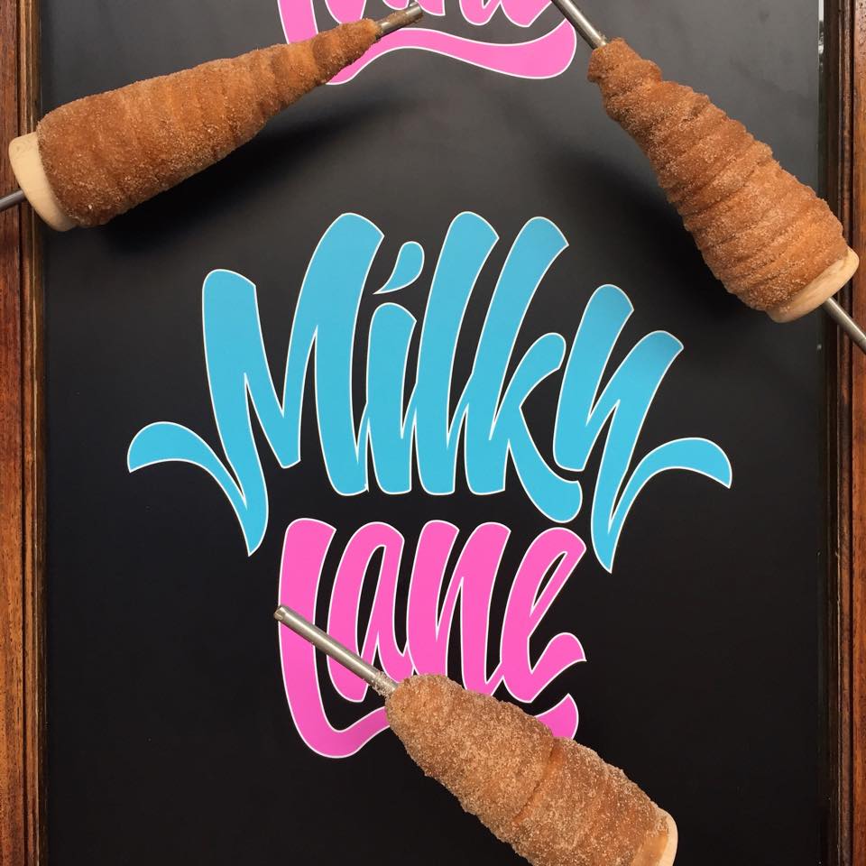 Milky lane logo with ice cream treats.