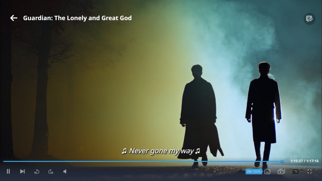 Screenshot from the Korean drama Guardian The Lonely and Great God showing the silhouettes of two men walking through the mist