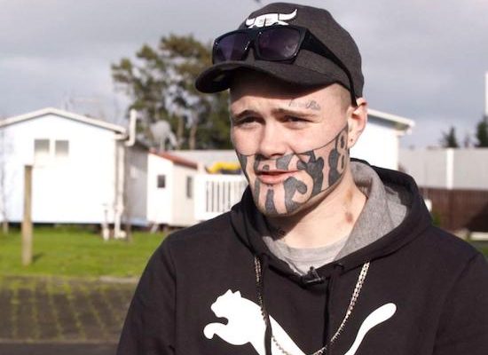 guy with devast8 tattooed across his face wonders why he i cant get a job