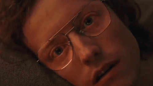 man looking confused and lost into space