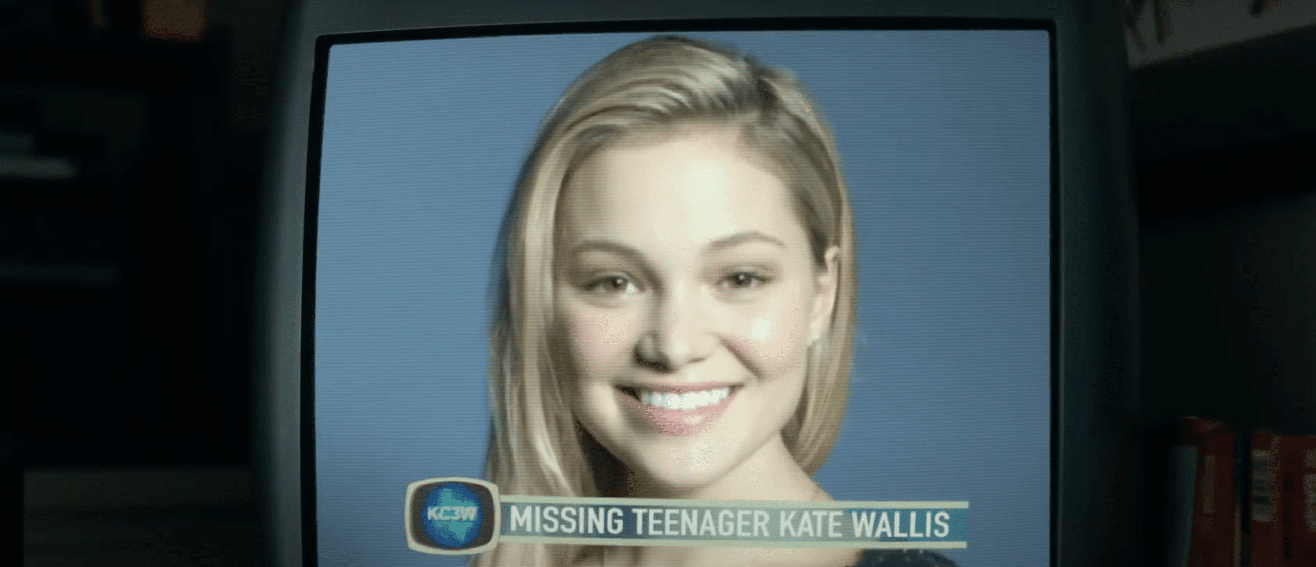 A photo of the missing teenager Kate Wallis is being shown on the television.