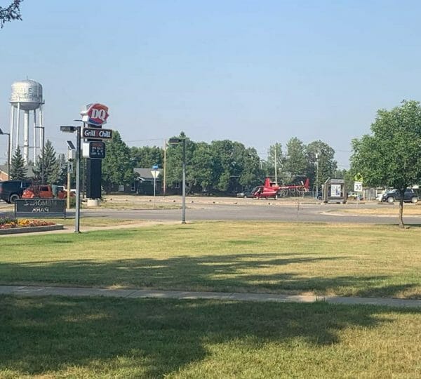 Helicopter landing outside Dairy Queen ice cream store