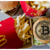 McDonalds Meal With Bitcoin Logo Over The Burger