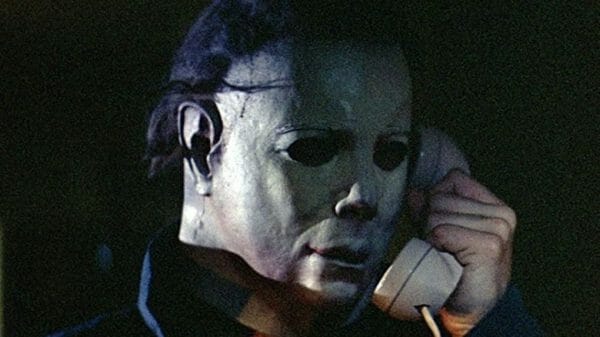 Credit to Compass International Pictures. Michael Myers is on the phone.