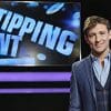 Credit to ITV. Host Bill Shepard stands in front of the Tipping Point stage and logo.
