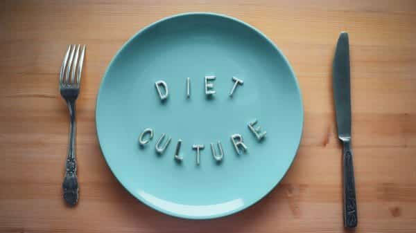 blue plate with diet culture spelled out