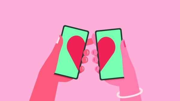 long distance relationship Illustration of two hands holding iPhones each displaying half a heart