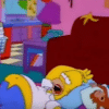 homer simpsons on floor with monkey
