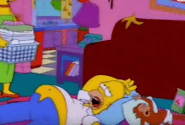 homer simpsons on floor with monkey