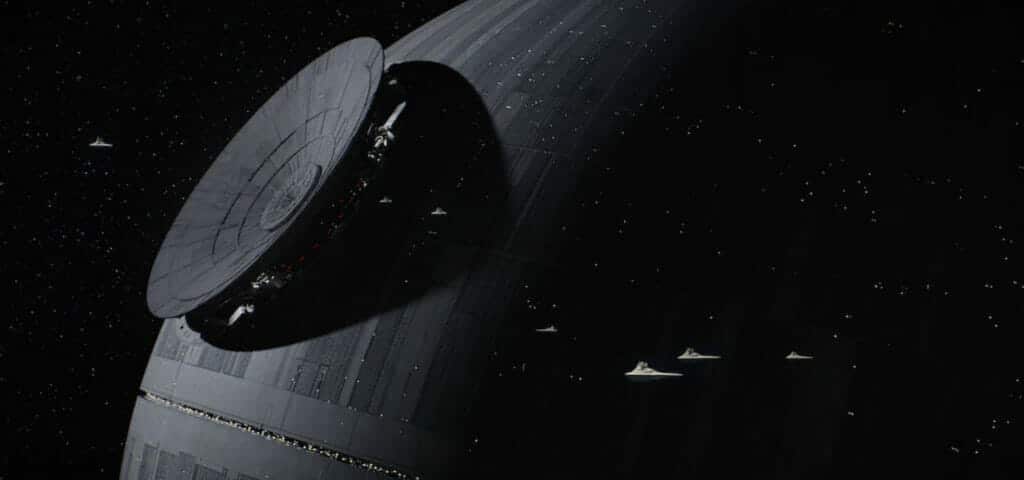 The Death Star floats ominously in dark space.