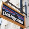 Patagonia clothing store sign with stone wall behind