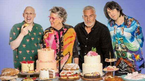 four people stood behind cakes and yummy baked goods