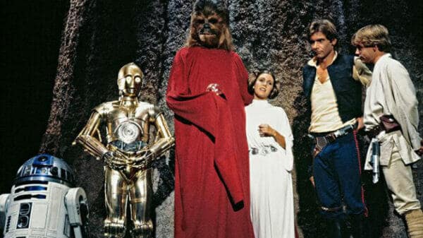 The Star Wars gang surround Chewie for a life day celebration