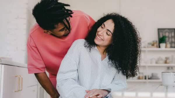 Couple smiling at each other playfully