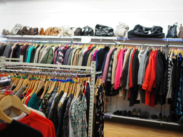 Racks of clothes in a thrift store