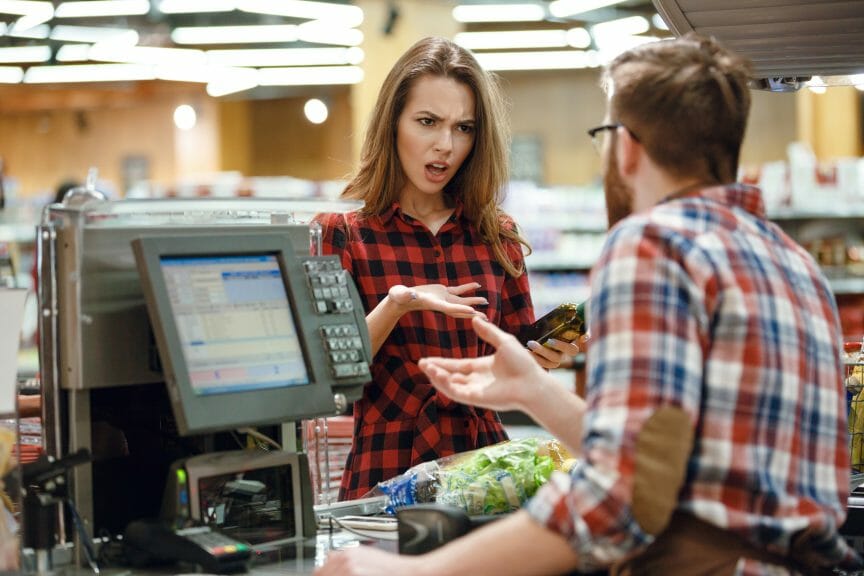 angry Karen customer yelling at cashier retail employee