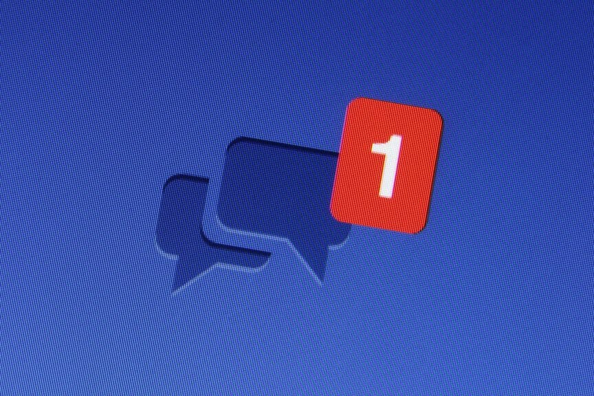 A photograph of an unread Facebook message.