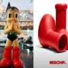 A model figure of Astro Boy to the left of MSCHF's Big Red Boots.