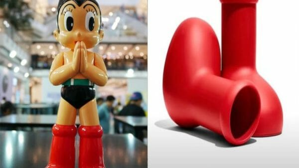 A model figure of Astro Boy to the left of MSCHF's Big Red Boots.