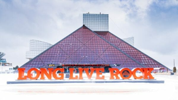 The Rock and Roll Hall of Fame Museum, with a sign that says "Long Live Rock" in front.