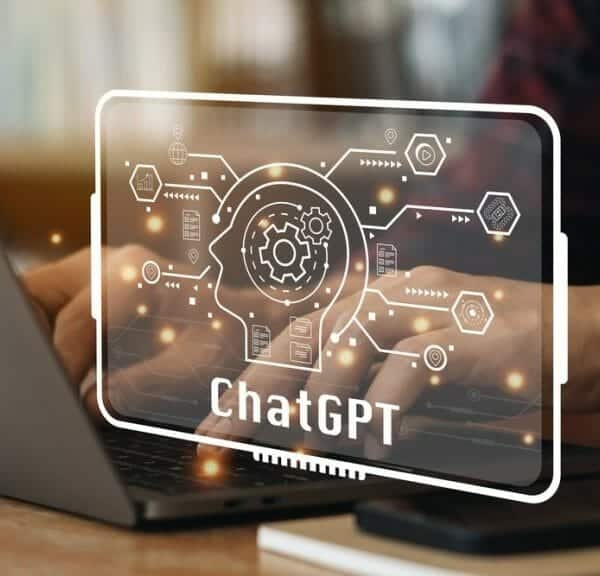 ChatGPT Chat with AI or Artificial Intelligence. Young businessman chatting with a smart AI or artificial intelligence using an artificial intelligence chatbot developed by OpenAI.