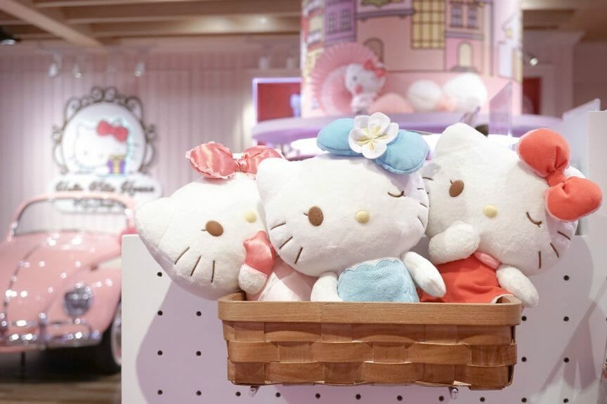 Hello Kitty plushies in a basket.