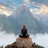 Woman Meditating in the Mountains