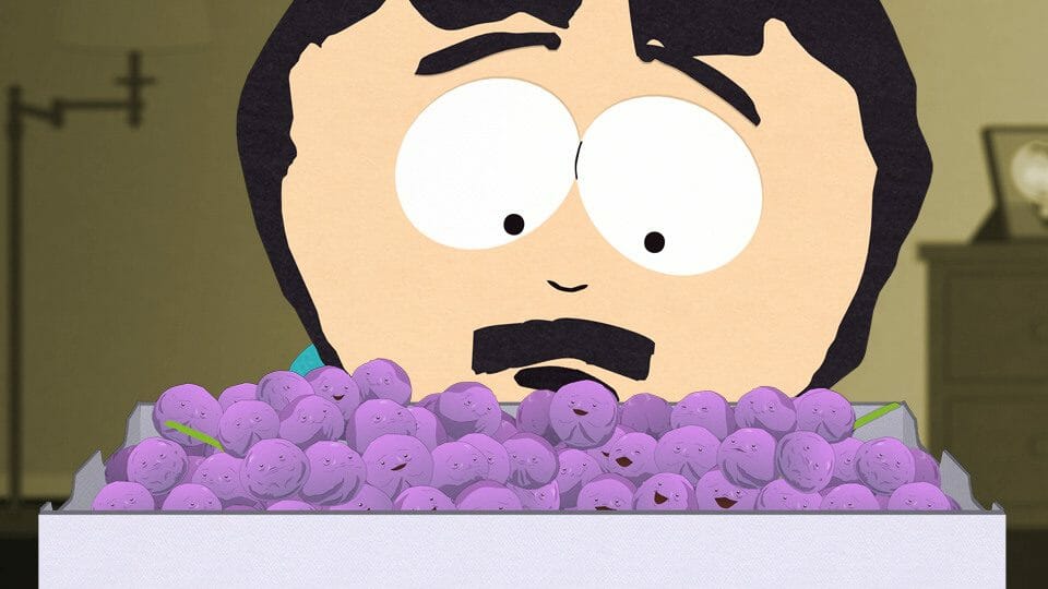 Randy Marsh staring at a basket of berries with faces on them