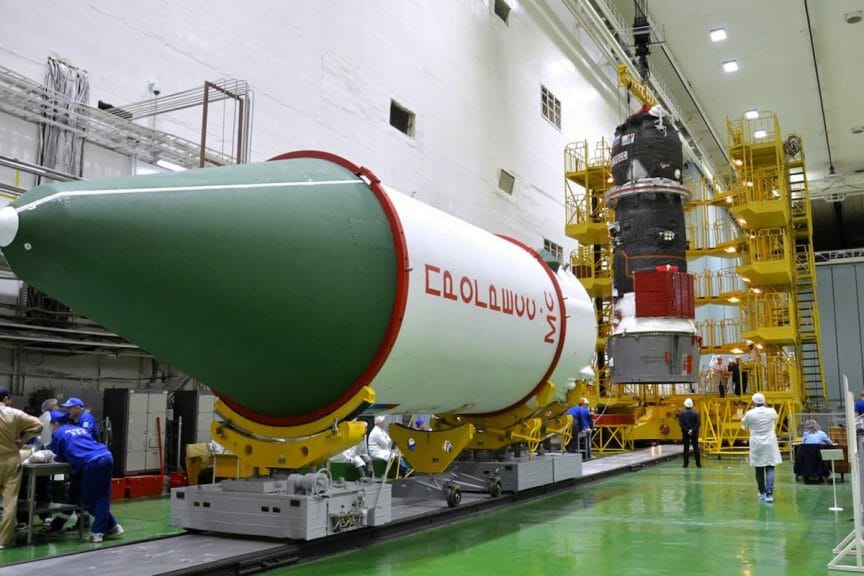 At the Baikonur Cosmodrome, preparations are underway to encapsulate Russia's Progress MS-23 supply ship within the payload shroud of its Soyuz launch vehicle.
