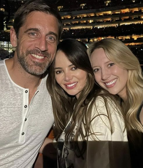 Aaron Rodgers caught two Taylor Swift performances with friends, including Miles Teller’s wife, Keleigh (center).