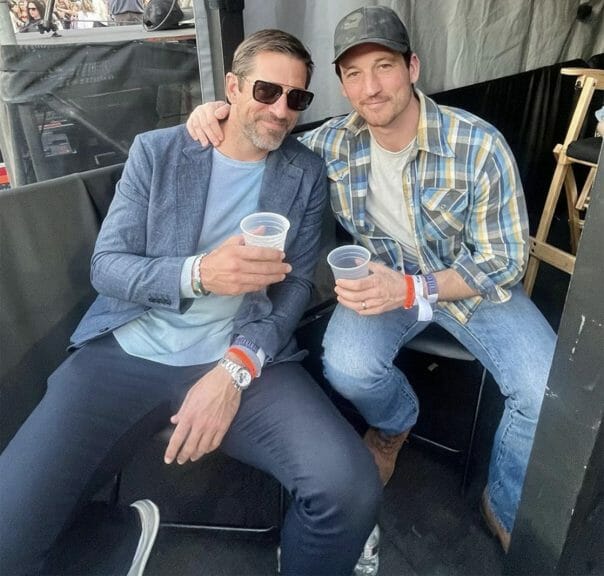 Aaron Rodgers and Miles Teller at the Taylor Swift concert.