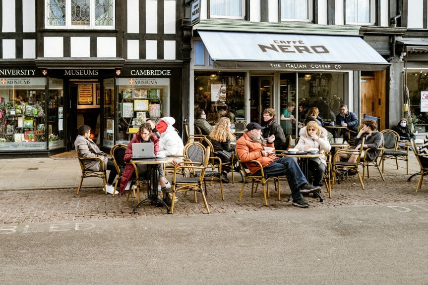 People enjoy ambiance outside of cafe