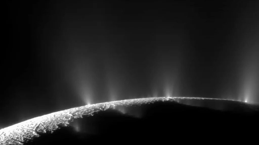 Cracks in the ice shell of Saturn's moon Enceladus serve as conduits, releasing dramatic plumes of ice particles, water vapor, and organic compounds into the vast expanse of space. Deep beneath this icy cover lies a hidden treasure—a salty ocean.