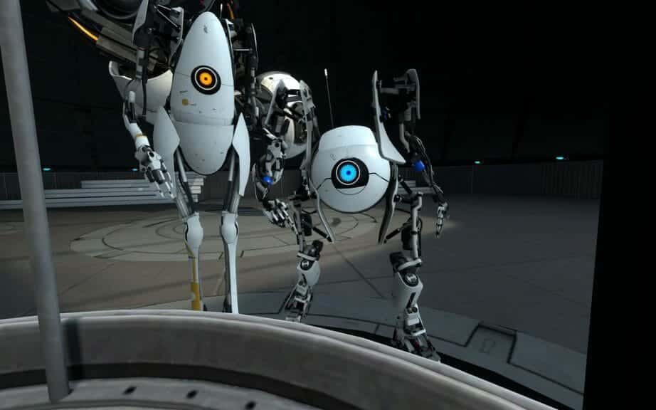 Two robots, one small, round, and blue, and the other tall, oval, and orange looking into camera in Portal 2 video game.