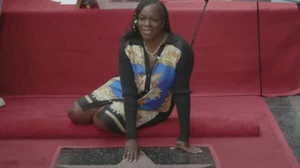Tupac's sister, Sekyiwa Shakur, on the Hollywood Walk of Fame.