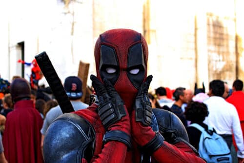 An image of Marvel's character 'Deadpool' looking shocked at the camera.