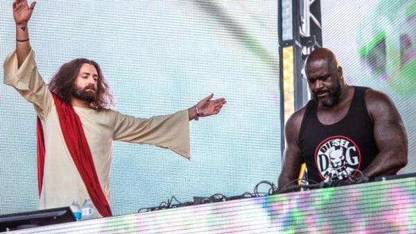 Shaq aka Diesel performs with a Jesus impersonator at Lollapalooza in Grant Park, Chicago.