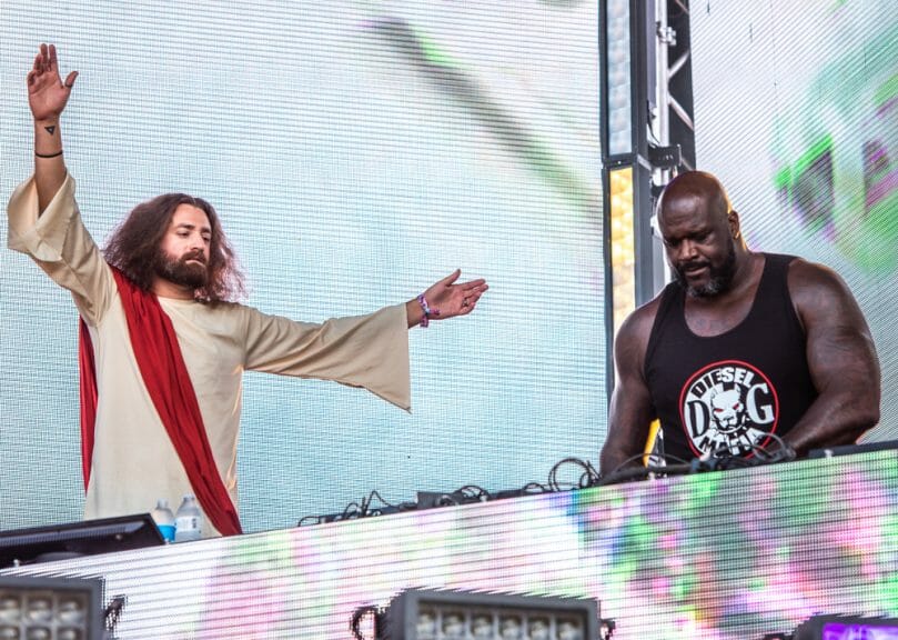 Shaq aka Diesel performs with a Jesus impersonator at Lollapalooza in Grant Park, Chicago.
