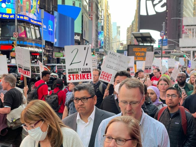 Crowds of members of the writers guild in a picket line, New York city