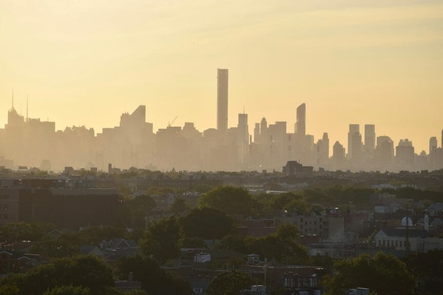 A red haze is visible over the New York City skyline as the Canadian wildfires intensify. Credit