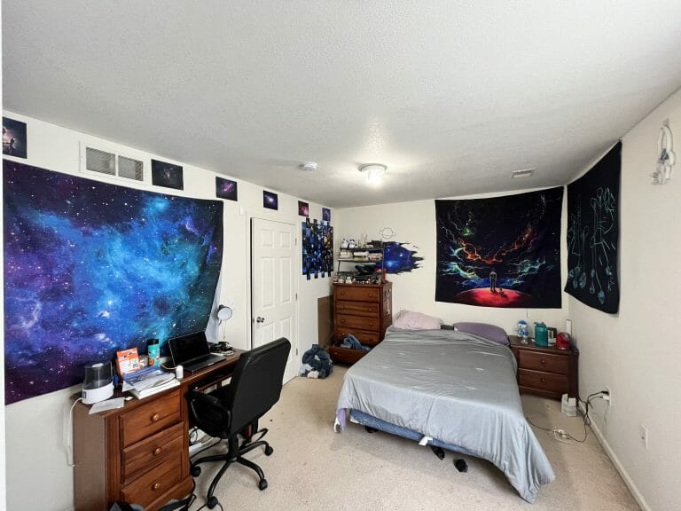 Space themed bedroom in a college apartment