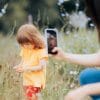 mommy-run account taking pictures of child
