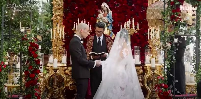 Kourtney Kardashian and Travis Barker getting married in an ornate Italian church.