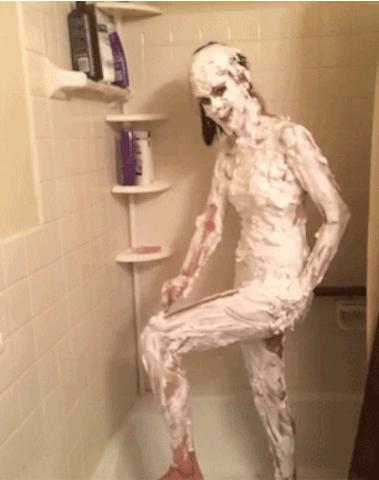 Girl shaving her whole body