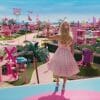 Barbie Margot Robbie looking out to her Barbie dreamland.