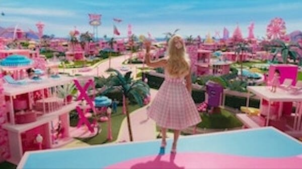 Barbie Margot Robbie looking out to her Barbie dreamland.