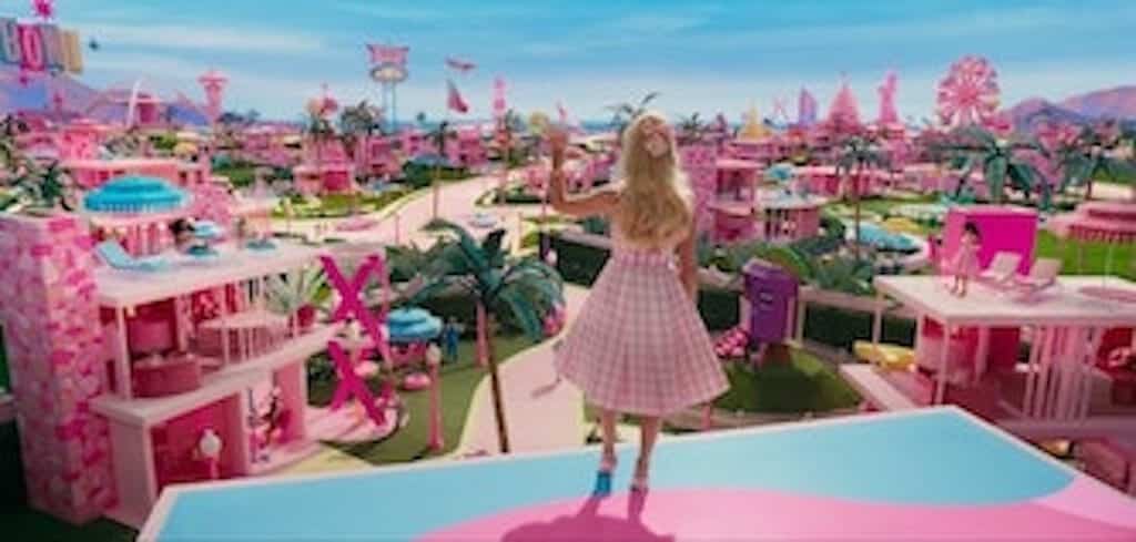 Barbie Margot Robbie looking out to her Barbie dreamland.