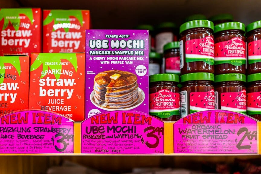Trader Joe's shelf (left to right): Sparkling Strawberry juice beverage, Ube Mochi Pancake & Waffle Mix, watermelon fruit spread