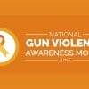 Banner of Gun Violence Awareness Month in orange.