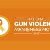 Banner of Gun Violence Awareness Month in orange.